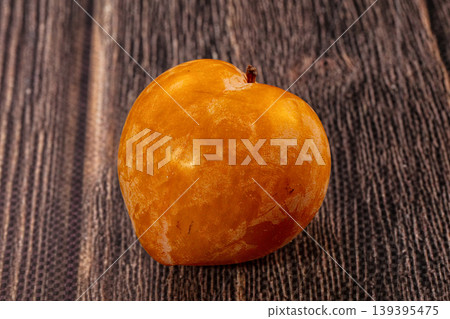 Fresh yellow plums, gray textured background. Healthy fruit still life Fresh yellow plums, gray textured background. Healthy fruit still life 139395475