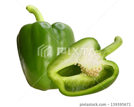 Green bell pepper and cut half against white Green bell pepper and cut half against white 139395671