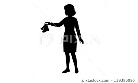 Silhouette of a woman holding a handkerchief 139396086