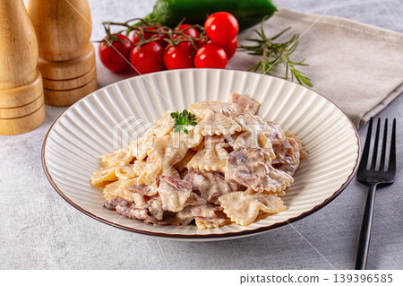 Pasta Carbonara - farfalle with bacon Pasta Carbonara - farfalle with bacon 139396585