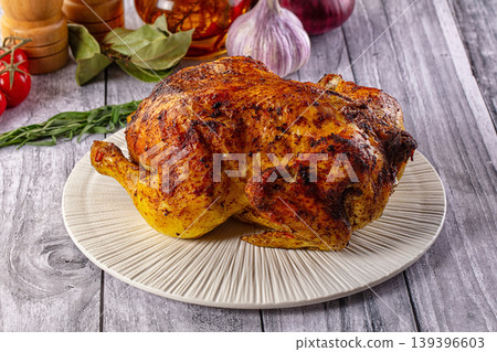 Hot tasty grilled whole chicken Hot tasty grilled whole chicken 139396603