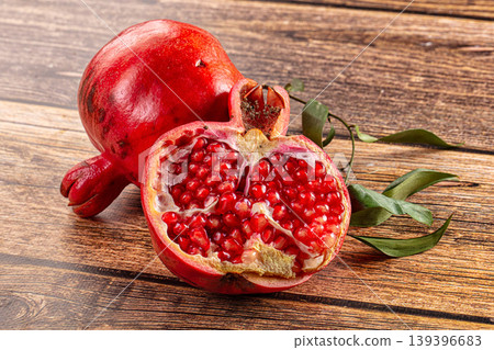 Ripe sweet juicy pomegranate fruit Ripe sweet juicy pomegranate fruit 139396683