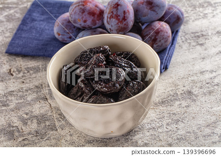 Black dry sweet prunes heap Black dry sweet prunes heap 139396696