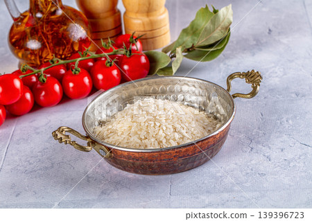 Raw dry white rice grain Raw dry white rice grain 139396723