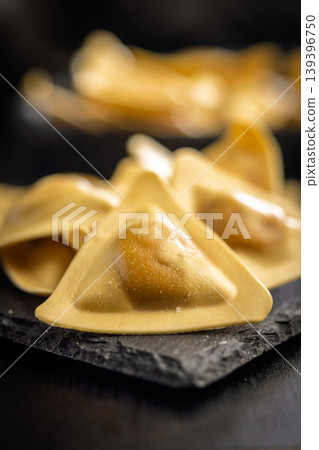 Close-Up Of Fresh Ravioli Pasta On Slate Board, Italian Handmade Dumplings For Cooking 139396750