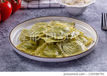 Italian dumplings ravioli with spinach 139396791