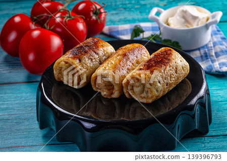 Stuffed homemade pancakes with meat Stuffed homemade pancakes with meat 139396793