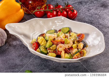 Gourmet shrimp salad with avocado and fresh vegetables in white bowl Gourmet shrimp salad with avocado and fresh vegetables in white bowl 139396884