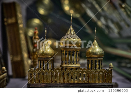 Ornate Orthodox church chalice with icon of Jesus Christ, religious liturgical object close up Ornate Orthodox church chalice with icon of Jesus Christ, religious liturgical object close up 139396903