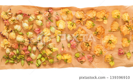 Flower buds on kraft paper. Cream colors. Floral design. Top view. 139396910
