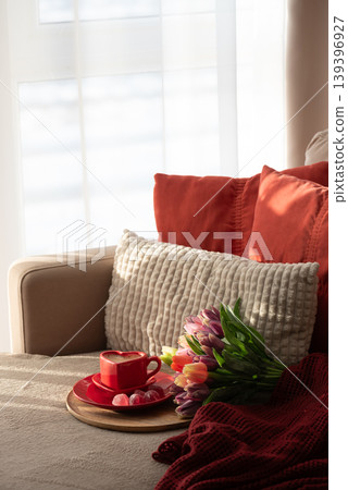 Heart Shaped Coffee Cup with Colorful Tulips and Candies. Heart Shaped Coffee Cup with Colorful Tulips and Candies. 139396927