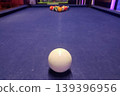 Racked billiard balls on purple pool table 139396956