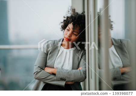 Portrait of a beautiful woman standing on terrace, feeling tired after long day. Portrait of a beautiful woman standing on terrace, feeling tired after long day. 139398077