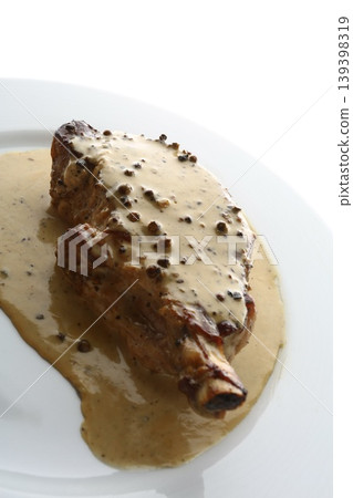 Entrecote Steak with Green Pepper Sauce on Plate Entrecote Steak with Green Pepper Sauce on Plate 139398319