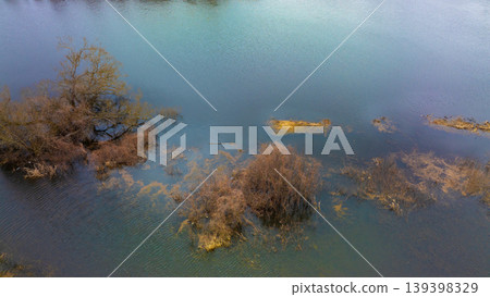 Aerial view moody sulking swamp marsh flooded landscape top view drone photography of dusk nature Aerial view moody sulking swamp marsh flooded landscape top view drone photography of dusk nature 139398329