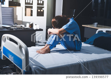 A patient with depression looks outside. A patient with depression looks outside. 139398577