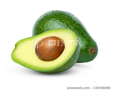 Fresh avocado and cut in a half of fuerte avocado with seed isolated. Green avocados with clipping path. Fresh avocado and cut in a half of fuerte avocado with seed isolated. Green avocados with clipping path. 139398890