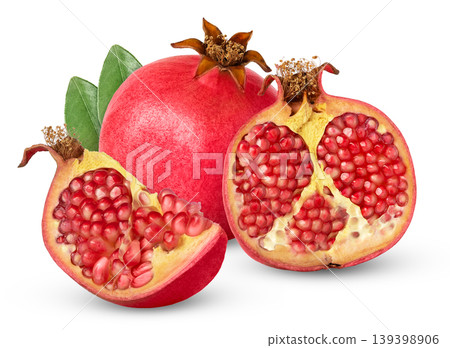 Fresh pomegranate with cut in half with green leaf isolated. 139398906