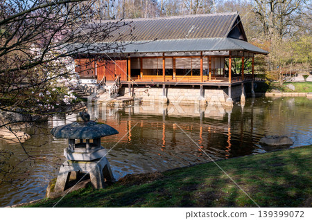 Tranquil scene of traditional Japanese teahouse with natural elements and peaceful ambiance Tranquil scene of traditional Japanese teahouse with natural elements and peaceful ambiance 139399072
