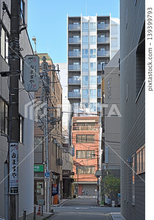 The charming back alleys of Kanda: A landscape where historical, long-established shop signs coexist with modern buildings. The charming back alleys of Kanda: A landscape where historical, long-established shop signs coexist with modern buildings. 139399793