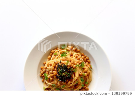 Natto pasta viewed from directly above against a white background. 139399799