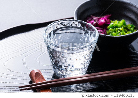 A Japanese-style image of chilled sake and pickles. 139400133