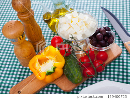 Traditional Greek fresh vegetable salad with feta cheese and herbs Traditional Greek fresh vegetable salad with feta cheese and herbs 139400723