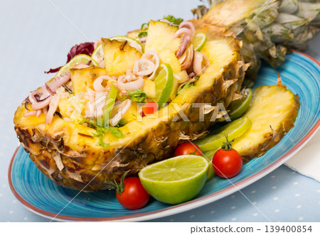 Salad with calamari, pineapple and lime Salad with calamari, pineapple and lime 139400854