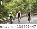 young asian people riding bicycle outdoors 139401447