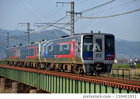 A three-car N2000 series train running on the Yosan Line. A three-car N2000 series train running on the Yosan Line. 139401931