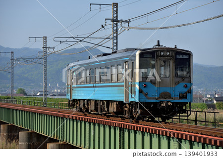 A single Kiha 54 series local train running on the Yosan Line A single Kiha 54 series local train running on the Yosan Line 139401933