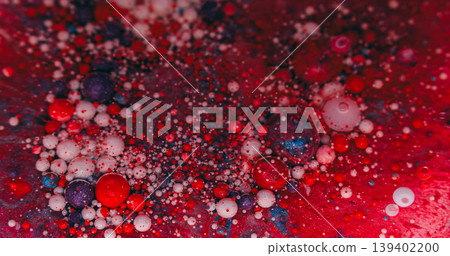 Oil drop. Paint liquid. Defocused red blue purple colorful water round droplets floating on abstract acrylic creative art background. Oil drop. Paint liquid. Defocused red blue purple colorful water round droplets floating on abstract acrylic creative art background. 139402200