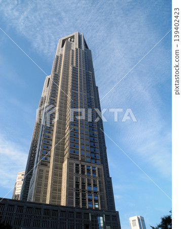 The Tokyo Metropolitan Government Building against a blue sky. 139402423
