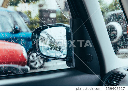 Rainy day scenery seen from a car window Rainy day scenery seen from a car window 139402617