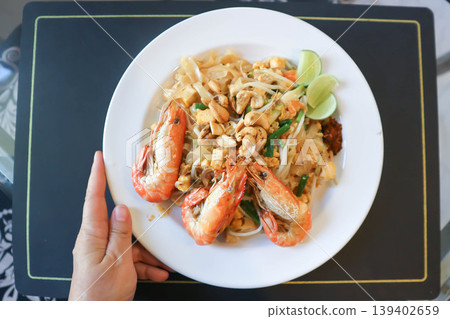 dry prawn noodles or stir fried noodles or pad thai , noodles without soup or Thai food or dry noodles or prawn noodles dry prawn noodles or stir fried noodles or pad thai , noodles without soup or Thai food or dry noodles or prawn noodles 139402659