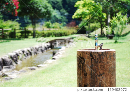 Drinking fountain in the garden 139402972