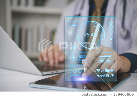Doctor hand using tablet stylus to analyze medical statistics hologram with charts and 75% percentage. Healthcare data analytics, digital research report, and hospital technology concept. Doctor hand using tablet stylus to analyze medical statistics hologram with charts and 75% percentage. Healthcare data analytics, digital research report, and hospital technology concept. 139403009