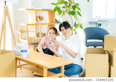 A couple preparing for moving A couple preparing for moving 139403105