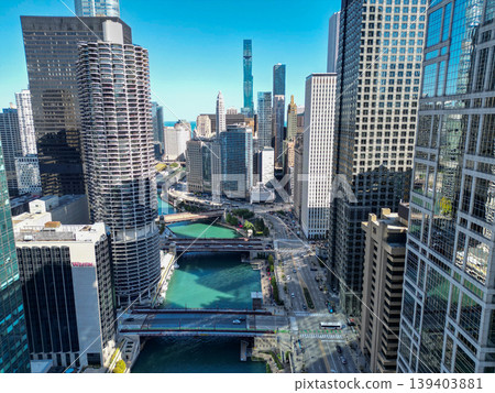 Chicago, USA - October 08, 2024: Iconic Chicago city downtown. Skyscraper architecture. Chicago city cityscape. Cityscape with skyscraper building. Downtown architecture and river. River in City Chicago, USA - October 08, 2024: Iconic Chicago city downtown. Skyscraper architecture. Chicago city cityscape. Cityscape with skyscraper building. Downtown architecture and river. River in City 139403881