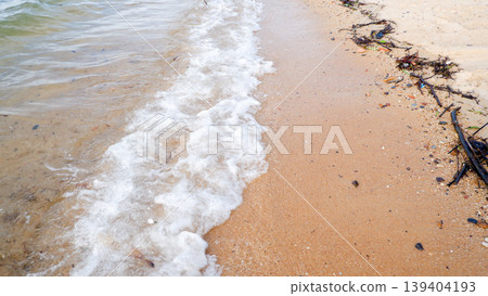Gentle Ocean Waves Lapping on Sandy Tropical Beach Shore Gentle Ocean Waves Lapping on Sandy Tropical Beach Shore 139404193
