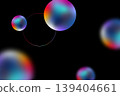 Colorful spheres float against dark backdrop, creating dreamy atmosphere. 139404661