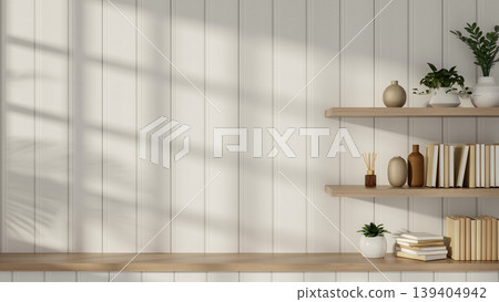 Books and potted plant on floating shelf on white slats wall over wooden countertop in a modern room Books and potted plant on floating shelf on white slats wall over wooden countertop in a modern room 139404942