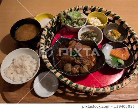 A lunch set with six different side dishes in a bamboo basket. A lunch set with six different side dishes in a bamboo basket. 139405055