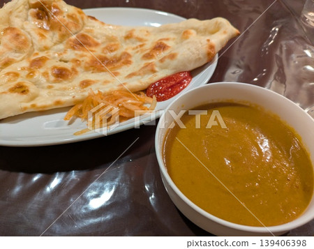 Naan and spice curry Naan and spice curry 139406398