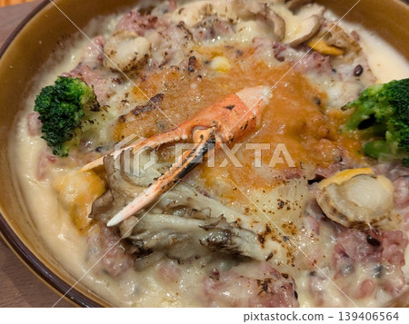 Seafood gratin with crab claws and scallops Seafood gratin with crab claws and scallops 139406564