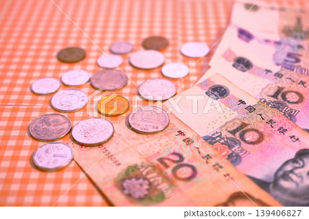 Chinese yuan banknotes and coins Chinese yuan banknotes and coins 139406827
