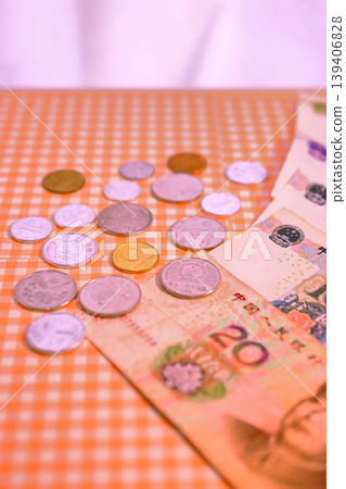 Chinese yuan banknotes and coins Chinese yuan banknotes and coins 139406828