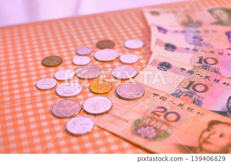 Chinese yuan banknotes and coins Chinese yuan banknotes and coins 139406829