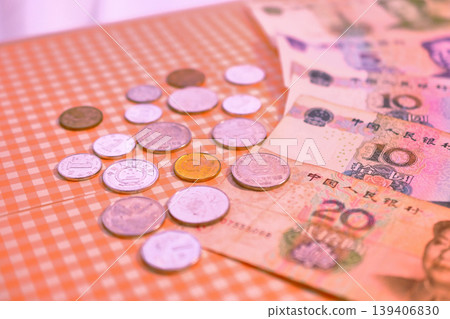 Chinese yuan banknotes and coins Chinese yuan banknotes and coins 139406830