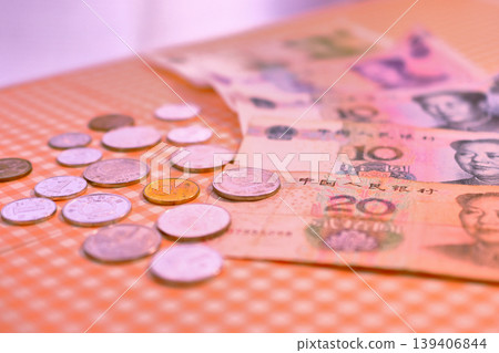 Chinese yuan banknotes and coins Chinese yuan banknotes and coins 139406844